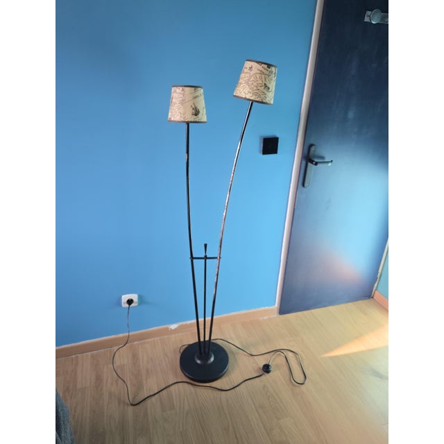 Two-light floor lamp, 1950. Two branches resembling reed stems emerge from the cast iron base. Art Deco or Art Nouveau...