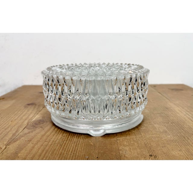 Vintage Industrial wall or ceiling lamp made in former Czechoslovakia during the 1970s. Was used in factory offices and...