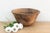 There is something deeply grounding about holding a vessel that was hewn by hand from a single block of wood. This antique...