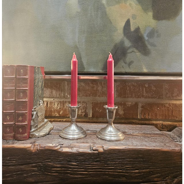 Pair of Towle weighted candlesticks, stamped on the bottom.