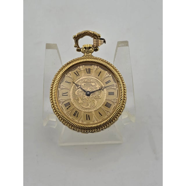 This rare vintage Ernest Borel pendant watch is a beautiful piece with a classic design. Featuring a mechanical manual...