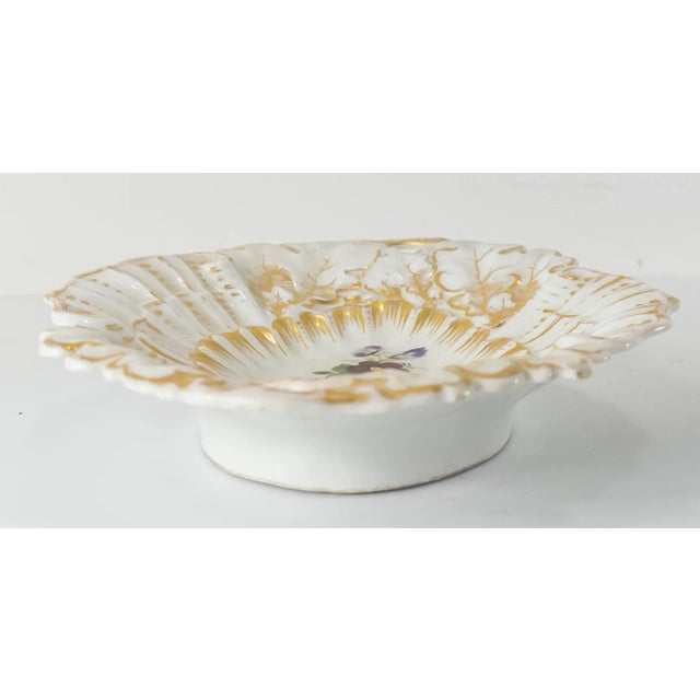 We are selling this KPM marked porcelain plate. This simple porcelain dish has molded form with oak leaves and central...