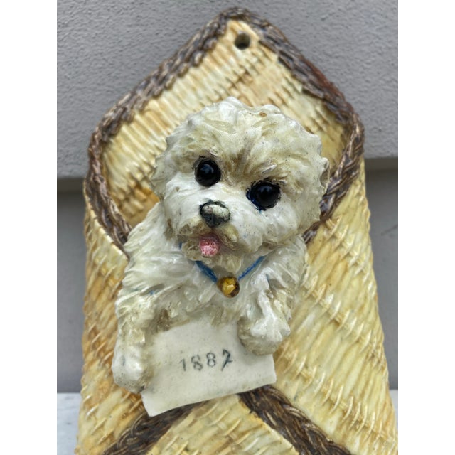 Large Majolica Basket Bichon Dog Wall Pocket signed TD Theodore Deck dated 1887.