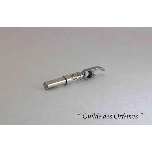 "Description : Georg Jensen Sterling Silver Bottle Opener & Cork Screw. Pattern : Lotus - Size : 3 3/4 in. Weight: Oz...