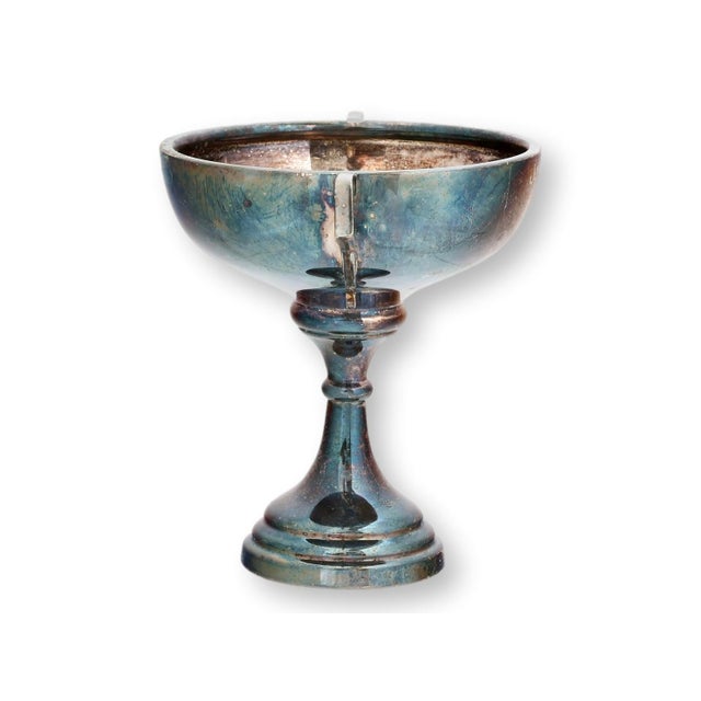 English silverplate trophy cup awarded to J.W. Mead for winning the 1929 1st Quarter Mile Open. Left with its richly aged...