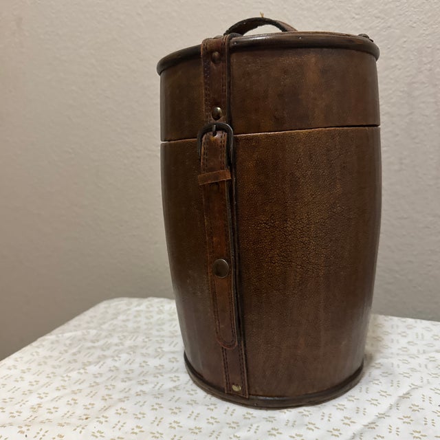 A refined and functional accessory, this leather wine bottle holder offers an elevated way to transport and present your...