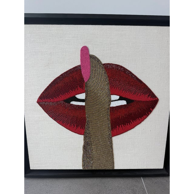 Linen ground with hand-applied glass beads. Wood frame with black stain finish.
