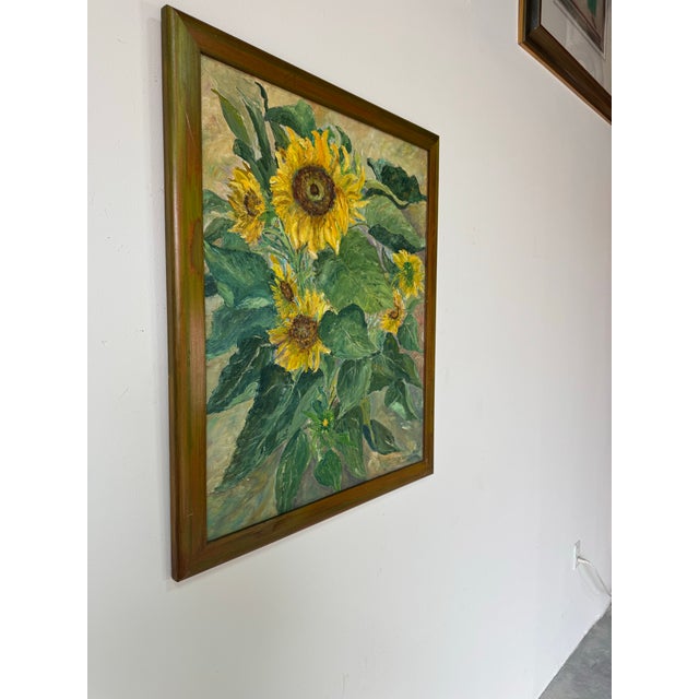 A vibrant and expressive 1970’s Impressionist oil on canvas by H. Slottman, featuring a lush cluster of blooming...
