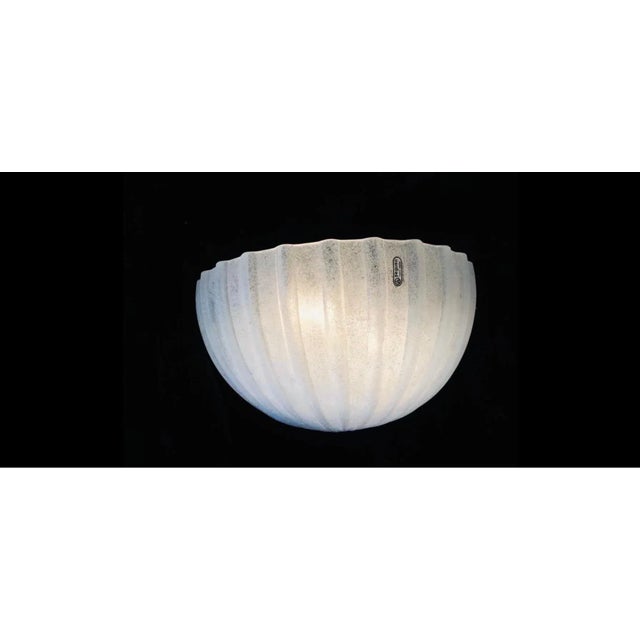 Superb pair wall lighting with large half globe glass ice frost Murano with structure. The Design and the quality of the...