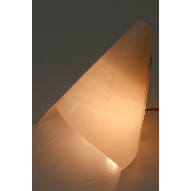 Extremely rare and elegant mid-century modern table lamp. Designed and manufactured probably in sweden, 1960s. executed in...