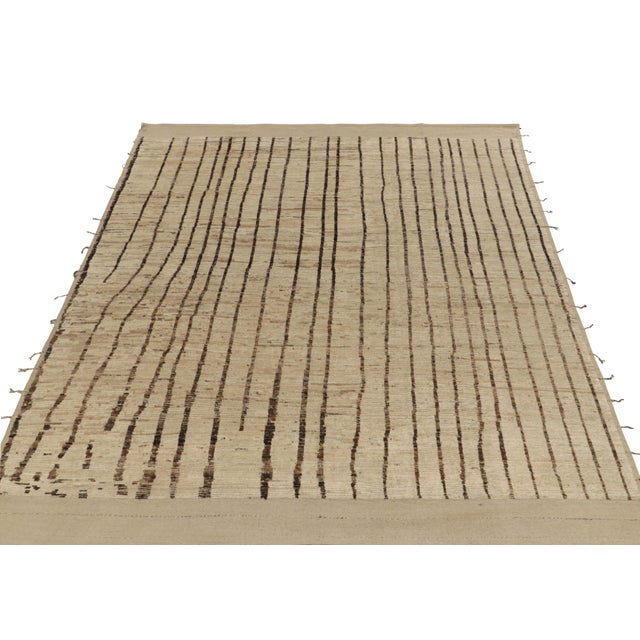 Rug & Kilim presents a contemporary take on Moroccan style with this 9x11 hand-knotted piece of exceptional texture. The...