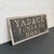 This vintage trade sign reading "Yardack Funeral Home" is most likely from the Yardack-Fox Funeral Home located in...