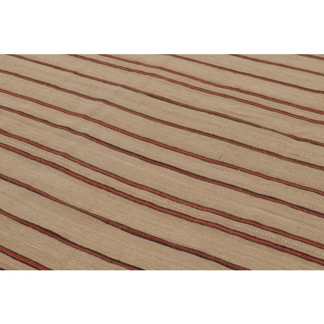 Handwoven in wool, this 9x8 vintage Persian kilim is a sophisticated addition to Rug & Kilim’s curation. Originating circa...