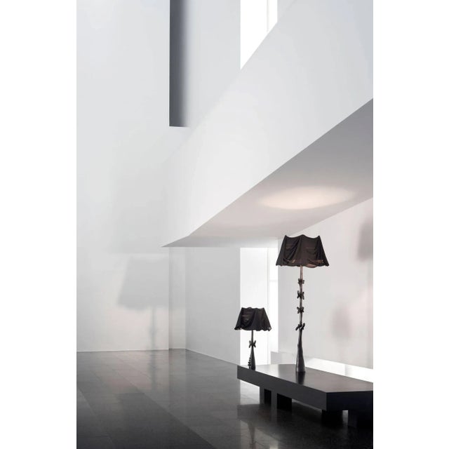 Drawers lamp designed by dali manufactured by bd. Carved structure in pale varnished limewood. Lampshade in black linen....