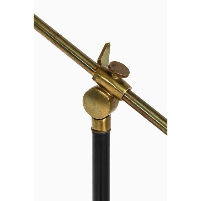 The ph-2/2 “water pump” floor lamp, designed by poul henningsen and produced by louis poulsen in the 1940s, is an...