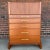 Tall dresser by Tommi Parzinger for Charak Modern. The piece has been professionally refinished to the highest standards....