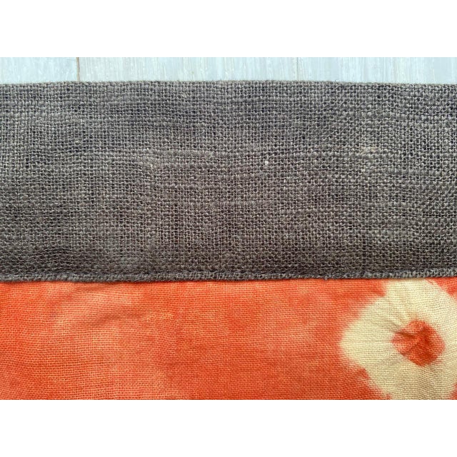Striking “pelangi” tie-dyed textile from Toraja Land, South Sulawesi. We added a linen border, double backed on both ends....