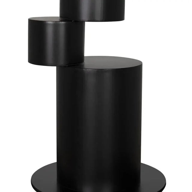 The Nola Metal Table in Matte Black brings an industrial flair to any space with its sleek, modern design. Crafted from...