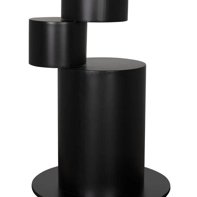 The Nola Metal Table in Matte Black brings an industrial flair to any space with its sleek, modern design. Crafted from...