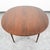 Drexel Declaration round dining table. Walnut wood throughout. Simple, yet well constructed and strikingly handsome.