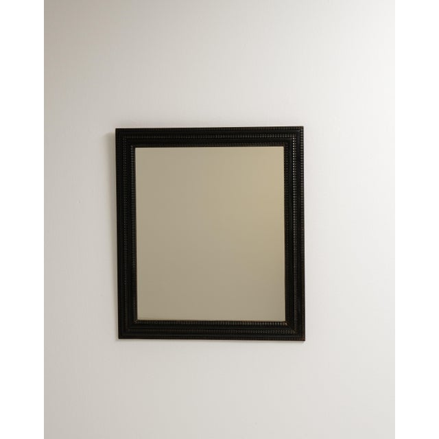 A characterful mirror with a dark patinated finish that adds depth and contrast. The simple yet bold frame makes it...