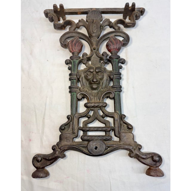 Up for sale is a lovely antique Victorian cast iron lion head table bench leg from the 19th century. The ornate design and...