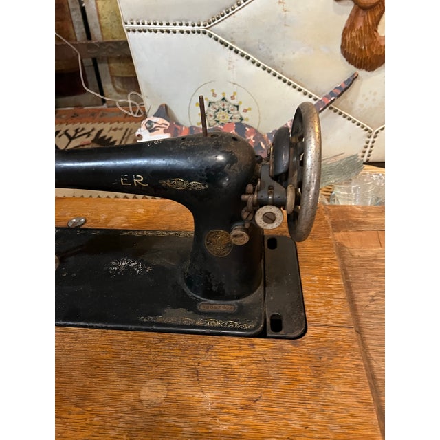 70's Singer Sewing Machine on Wooden Table | Chairish