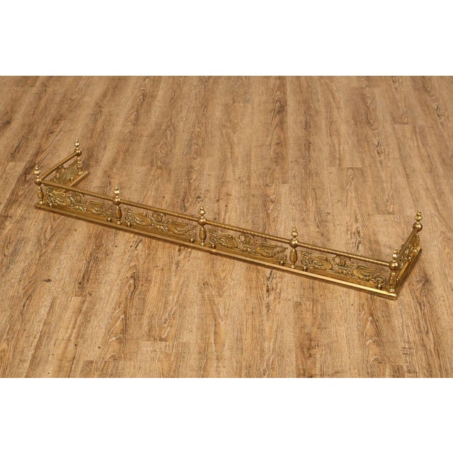 High Quality Decorative Brass Fireplace Fender With Pierced Classical Motifs And Finial Accents
