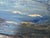 This original oil painting by V. Caskey, dated 1975, captures a peaceful coastal harbor lined with weathered waterfront...
