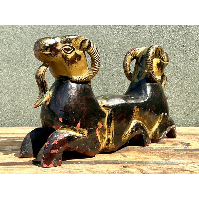 This striking Janus-style dual-headed ram sculpture is a premier example of Egyptian Revival aesthetics blended with...