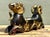 This striking Janus-style dual-headed ram sculpture is a premier example of Egyptian Revival aesthetics blended with...