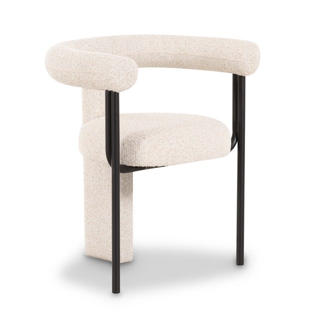 The Synn Dining Chair brings a postmodern punch to your dining space with its sculptural curves and artful tubular design....
