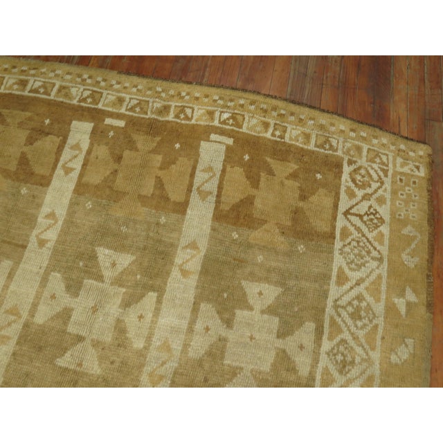 An unusual Turkish rug with charming cream and cocoa color accents made for a wedding present for a family in Turkey....