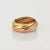 Vintage les Must de Cartier 5 band Trinity ring crafted in 18k yellow, white & rose gold (circa 1980s). The Cartier ring...