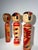A rare set of three monumental traditional japanese turned wooden dolls, known as kokeshi dentō. Originating from the...