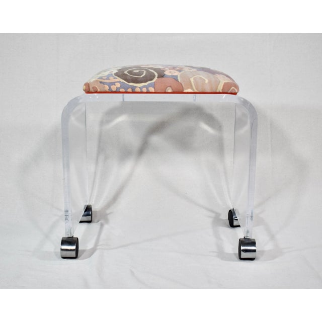 Hollywood Regency Charles Hollis Jones for Hill Manufacturing Lucite bench on casters upholstered in Jack Lenore Larson...