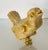 Lovely casted singing sparrow bird figurine mounted on a brass base as lamp finial.