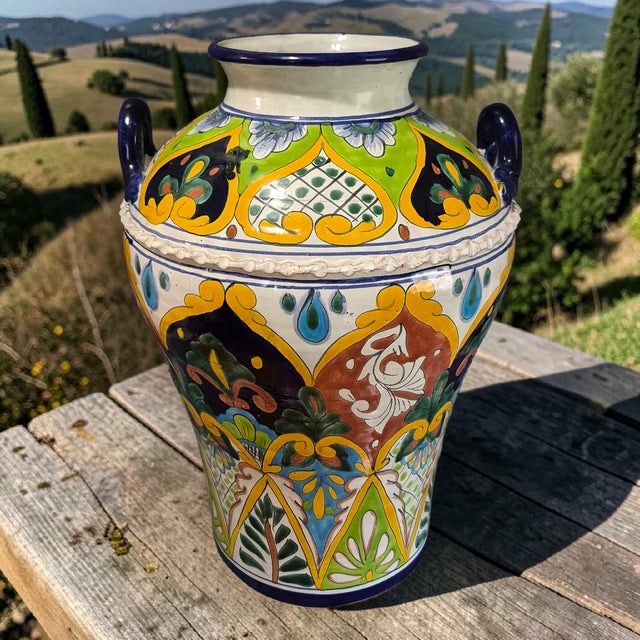 This beautiful and unique Talavera floor vase jug stands at 19 inches tall, featuring striking colors and intricate hand-...