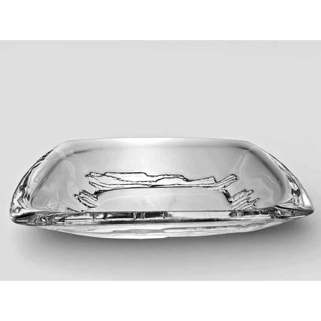 Rectangular centrepiece by Daum France, crystal glass with a texture motif to base . Engraved signature Daum France. This...