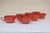 Set of seven coffee/tea cups made of melamine (specifically Melmac) which was the brand name for this dinnerware molded...
