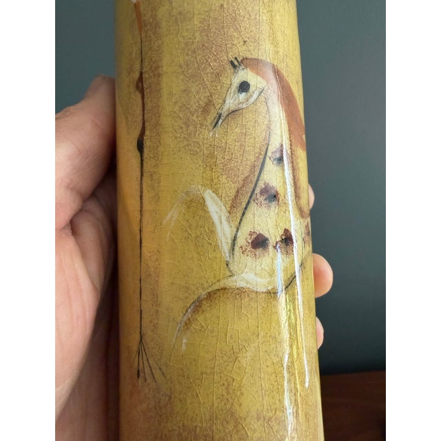 Beautiful signed Pillin Art Pottery vase featuring a hand-painted scene depicting a horse, a man, and a bird in a charming...
