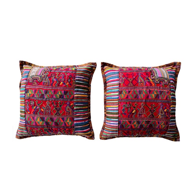 Offered is a pair of handcrafted vintage Guatemalan textiles sewn into intricate patchwork pillows. The textiles include...