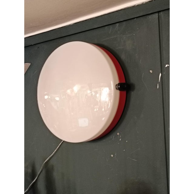 Model 2807 is a celebrated wall lamp designed by the renowned designer Elio Martinelli for Martinelli Luce in the late...