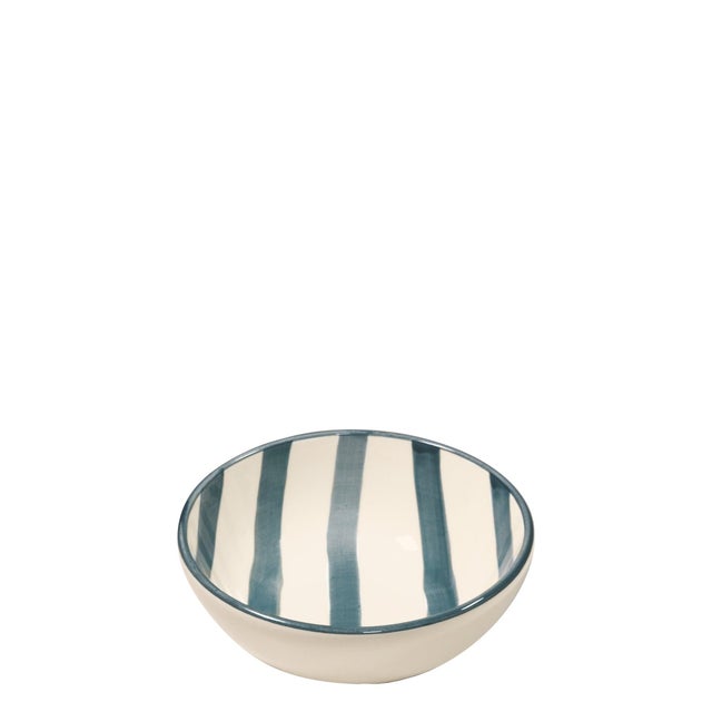 Hand-painted ceramic stoneware collection crafted in a historic factory in Civita Castellana Italy, a village where...