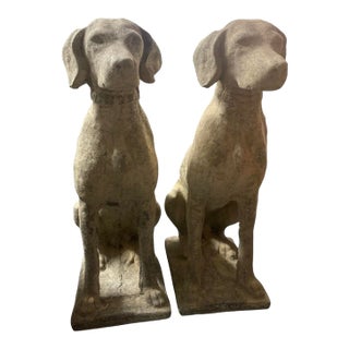 Pair of Vintage Weathered Cast Stone Seated Hound Garden Statues For Sale