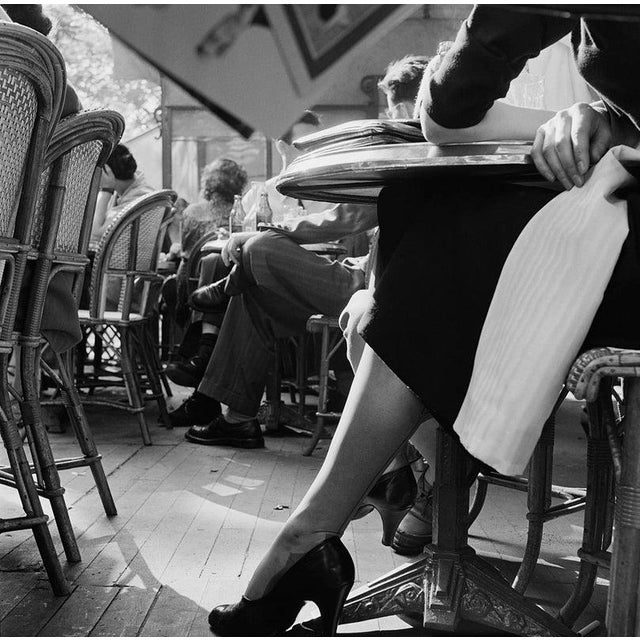 Elegant Ankle Customers sitting on the terrace of a cafe on the Champs-Elysees, Paris, June 1951. Original publication:...