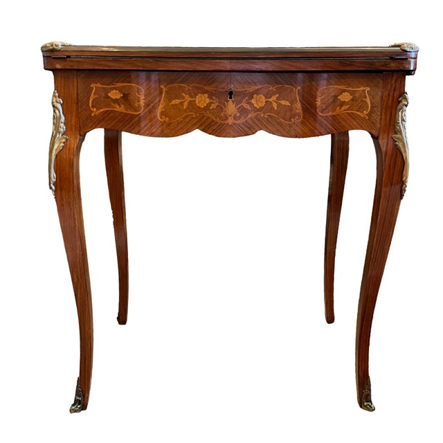 Fabulous turn-of-the-century, French-style game table with all the bells and whistles! The table features beautiful inlay...