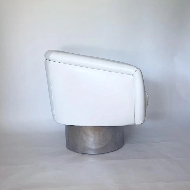 Vintage Leather Swivel Lounge Chair on Chrome Base attributed to Milo Baughman, American circa 1970's.