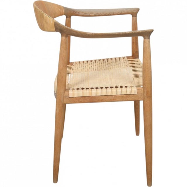 Hans wegner the chair jh501 with a frame of oak and back and seat of wicker. The chair is from the 1960s but was later...