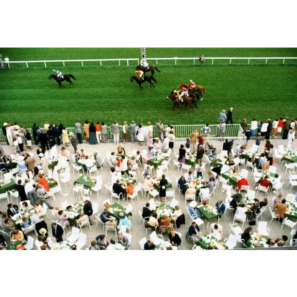 Racing at Baden Baden 1978 Spectators dine in the open air as the horses go by at Baden Baden racecourse, Germany,...